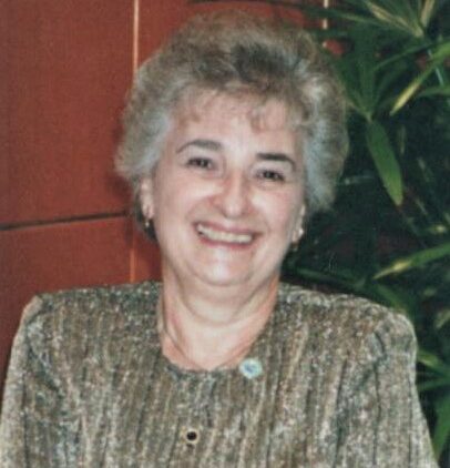 Angela M Lewis